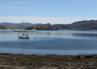 Sail boat in Isle Martin bay